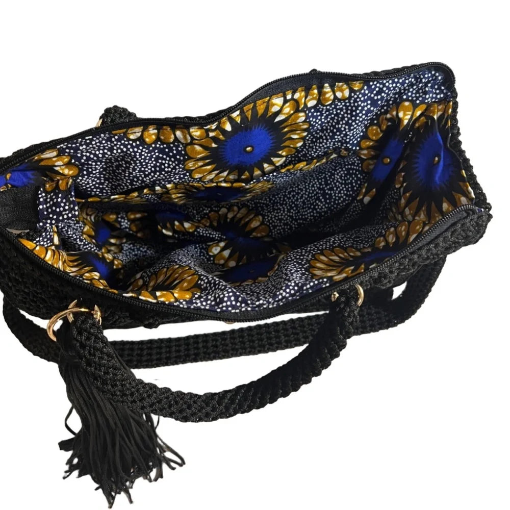 Interior view of a ThreadsByHannah crossbody women's handbag featuring floral design and braided straps