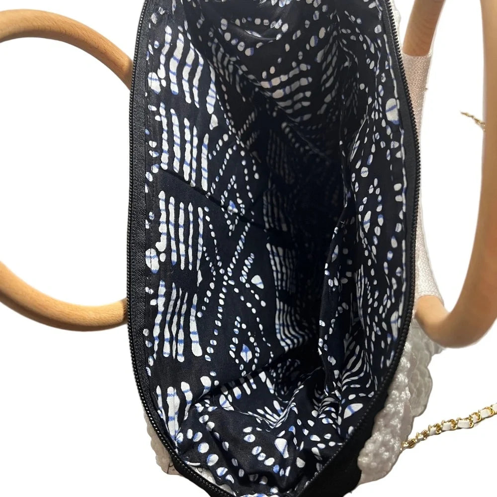 Inside view of the ThreadsByHannah Crossbody Womens Handbag Tote featuring elegant patterned lining