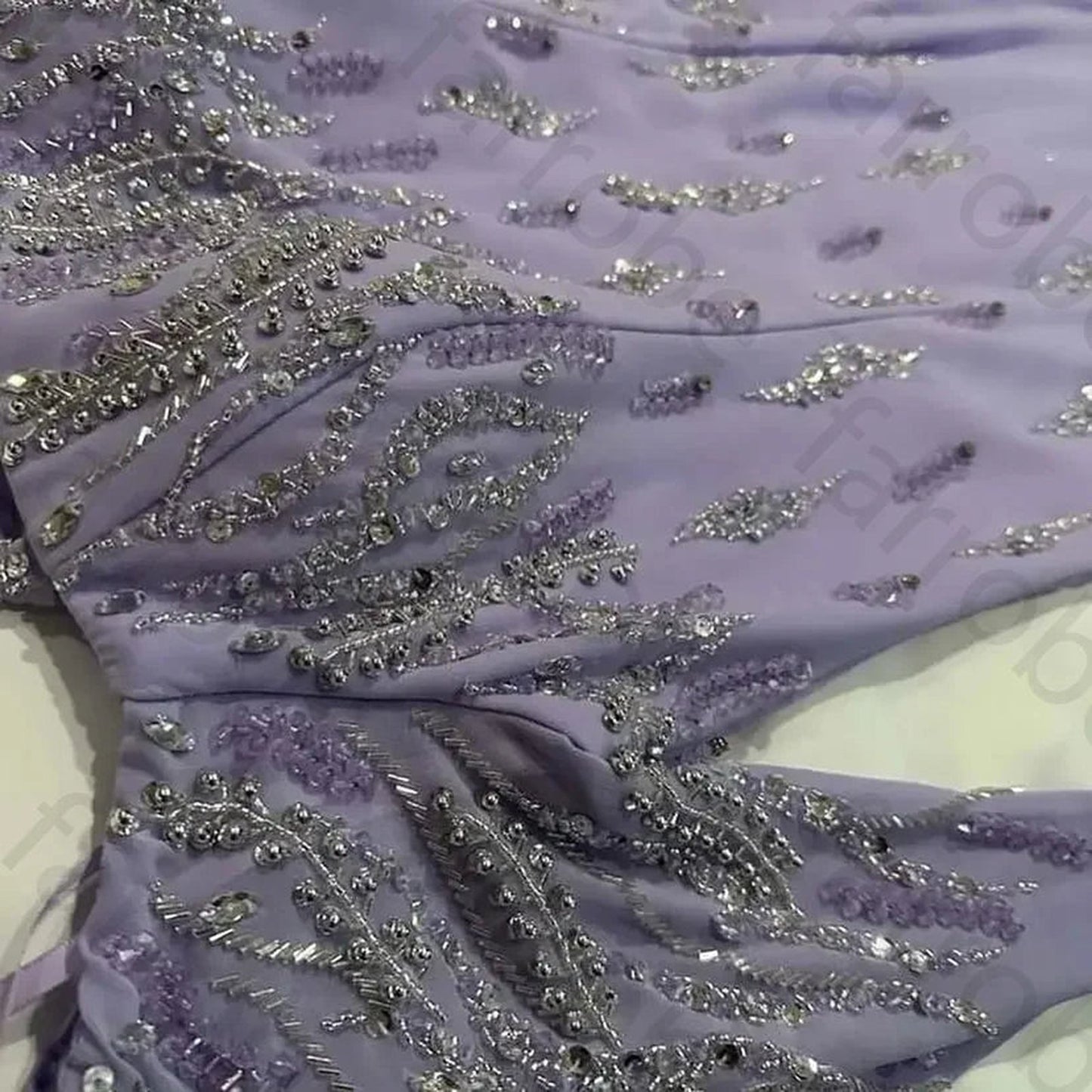Custom Arabic lilac mermaid prom dress with intricate beading and elegant design details
