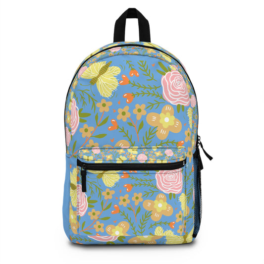 Custom butterfly and flower backpack with vibrant floral patterns on a blue background