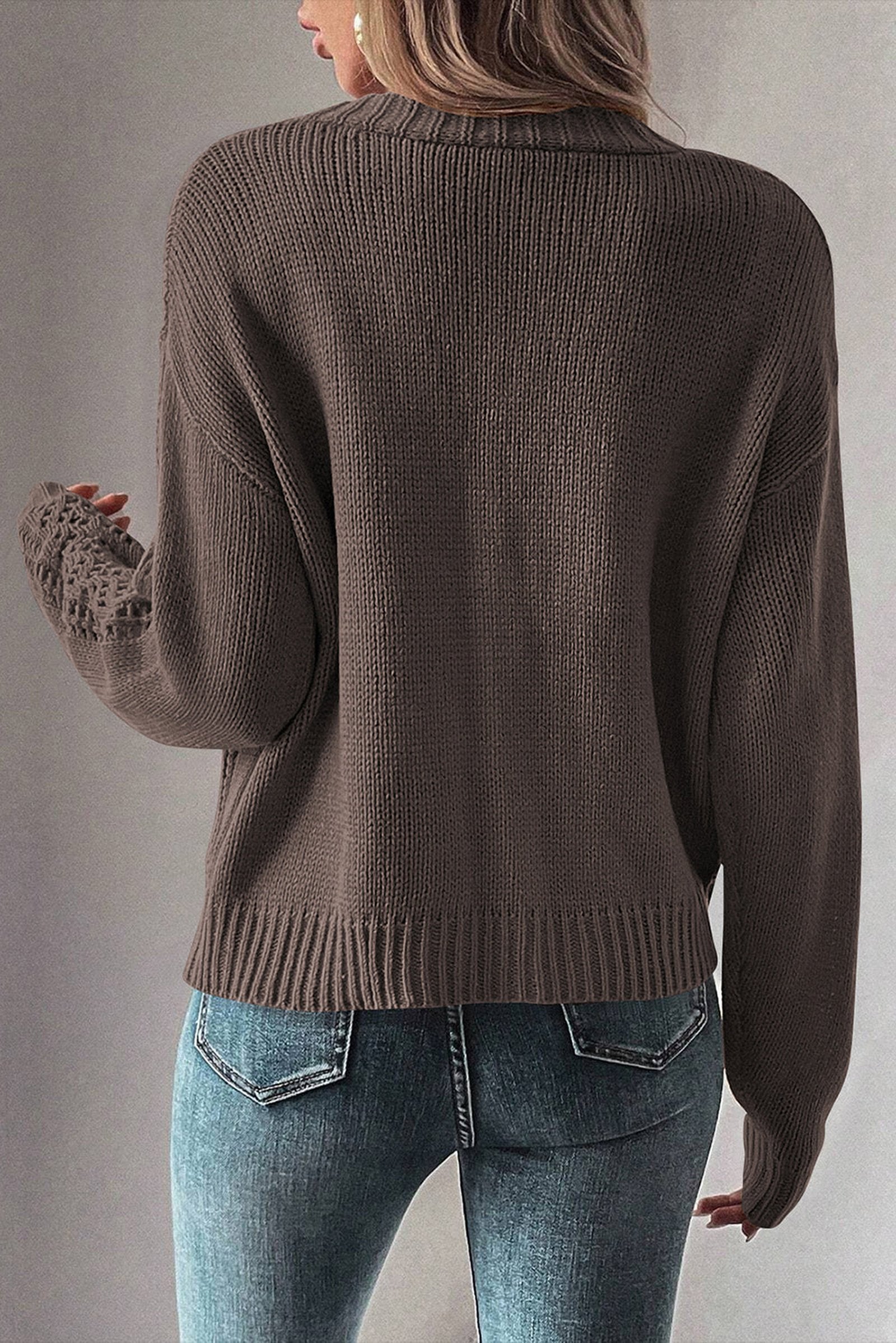Back view of a dark khaki open knit cardigan from LuckeLadybug with loose fit and ribbed details