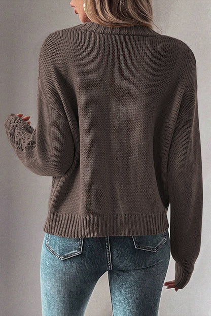Back view of a dark khaki open knit cardigan from LuckeLadybug with loose fit and ribbed details