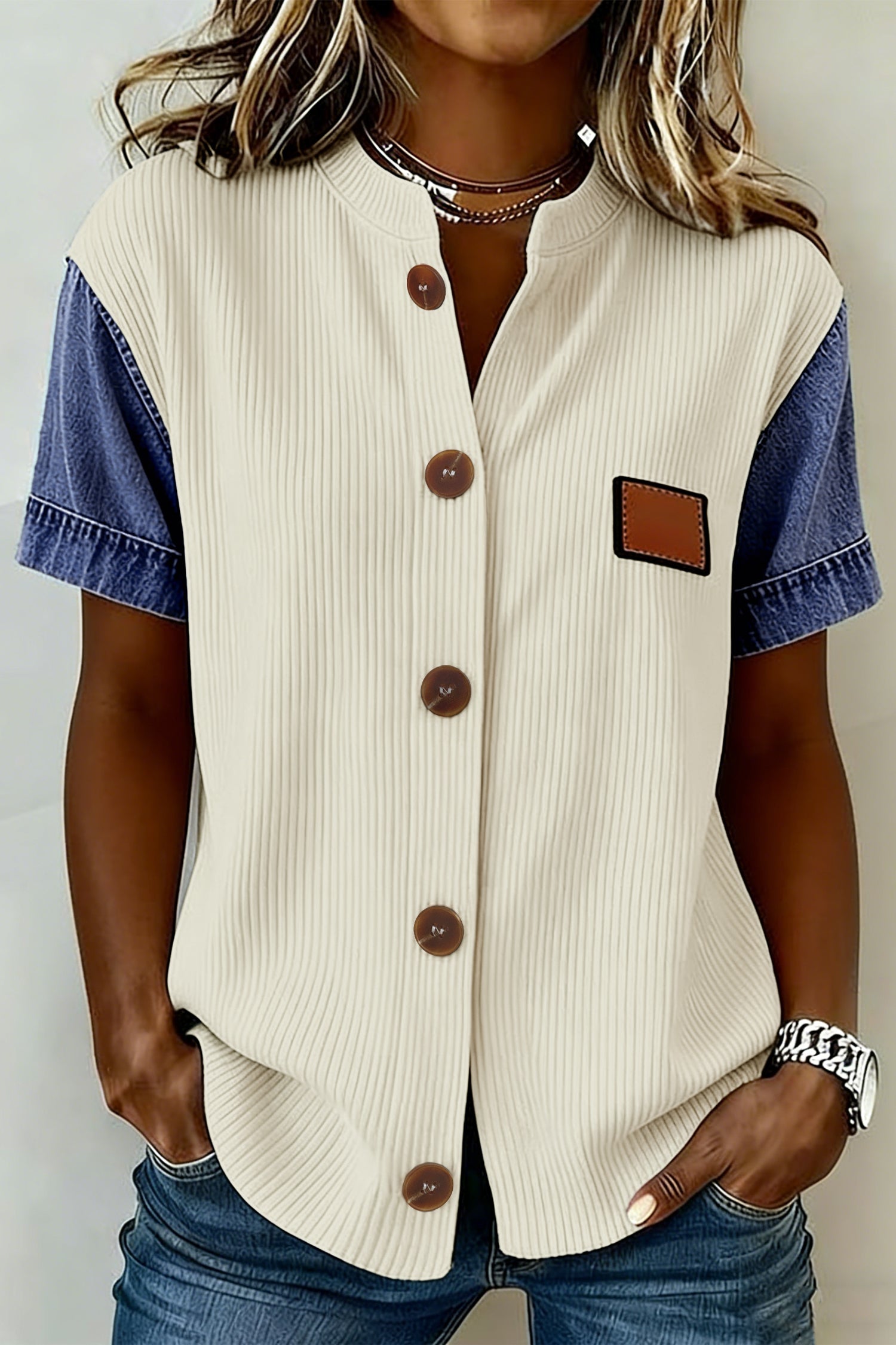 LuckeLadybug LLC Denim shirt featuring a ribbed design and contrasting denim sleeves for a stylish look