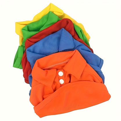 Variety of colorful dog polo shirts for small dogs stacked in vibrant hues of red, blue, orange, yellow, and green