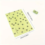 Eco-friendly poop bags for dog in green with paw print design, measuring 30cm by 23cm