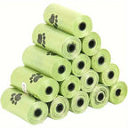 LuckeLadybug biodegradable poop bags for dog in eco-friendly green rolls stacked for easy access
