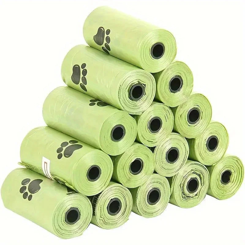 LuckeLadybug biodegradable poop bags for dog in eco-friendly green rolls stacked for easy access