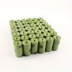 Eco-friendly LuckeLadybug LLC poop bags for dog in green color with paw print designs