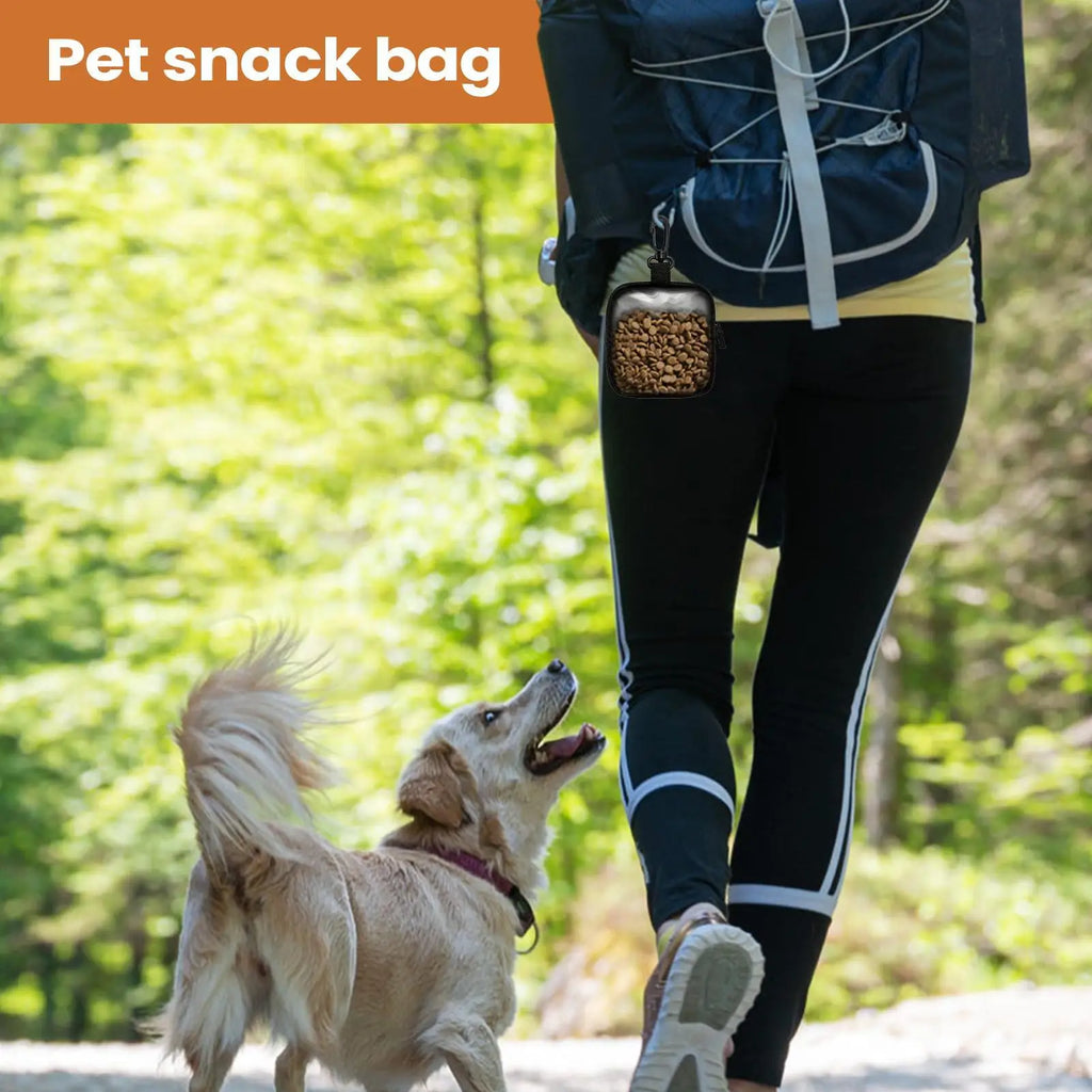 LuckeLadybug dog treat pouch attached to a hiker's waist for convenient pet snacking on outdoor adventures