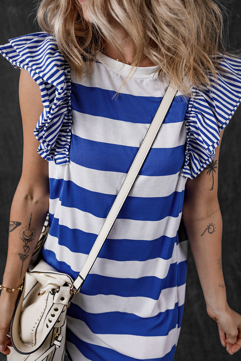 Blue and white striped dress from t-shirt with ruffled sleeves, perfect for casual summer outings