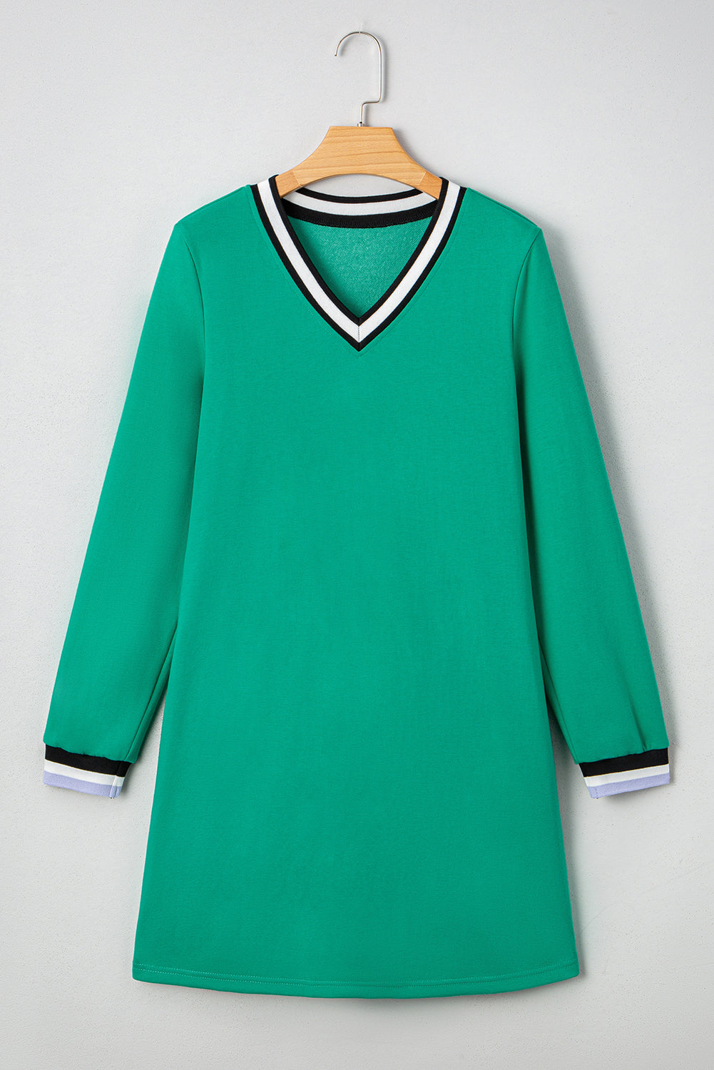 Green LuckeLadybug LLC dress from t-shirt with a stylish V-neck and long sleeves