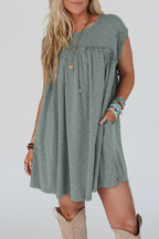 LuckeLadybug LLC green dress from t-shirt with short sleeves and side pockets for a casual look