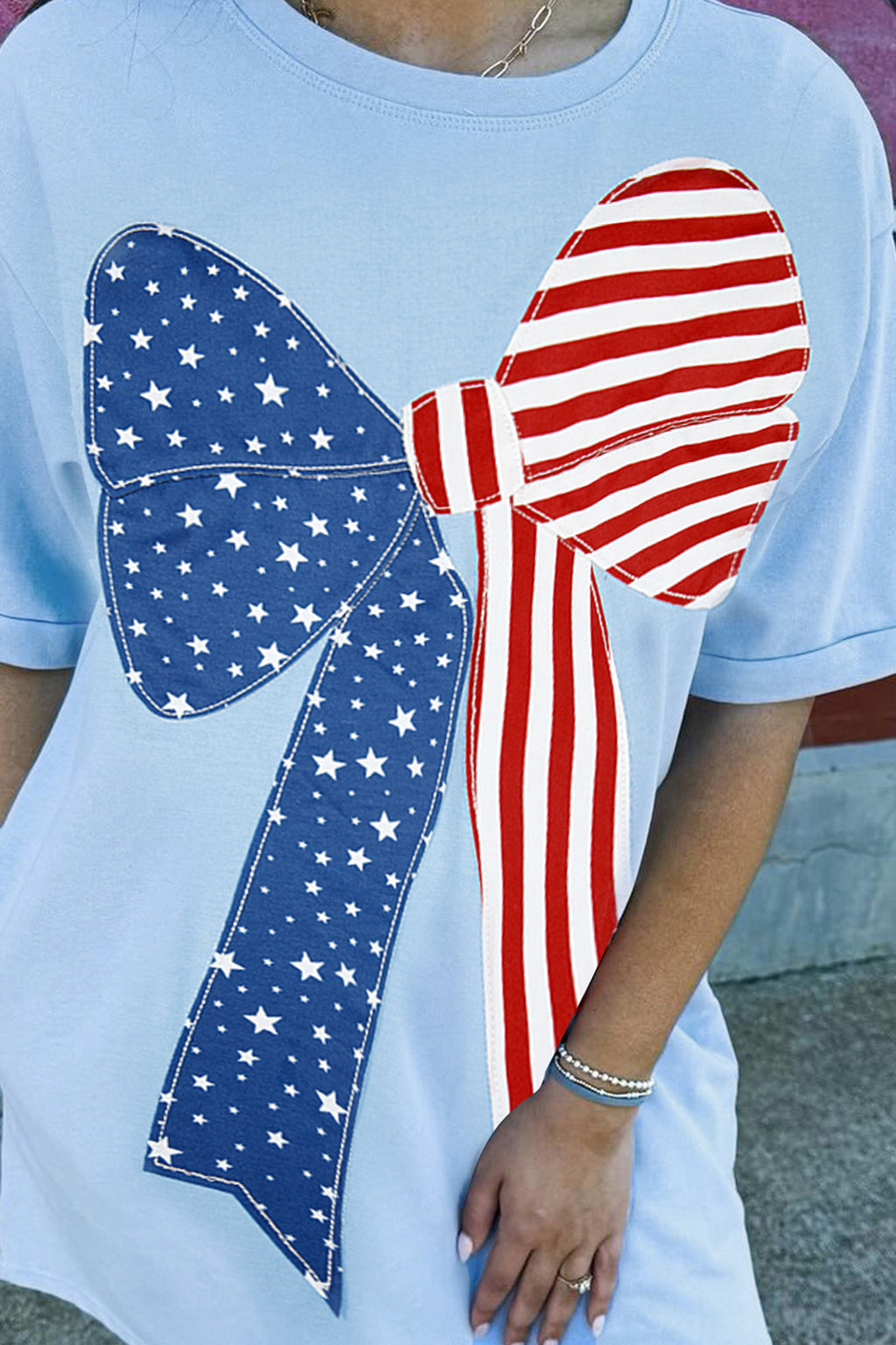 LuckeLadybug LLC T-Shirt featuring a patriotic bow design, ideal as a casual dress mini dress