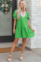 Green LuckeLadybug LLC fit and flare mini dress with pink details and puff sleeves, perfect for casual outings
