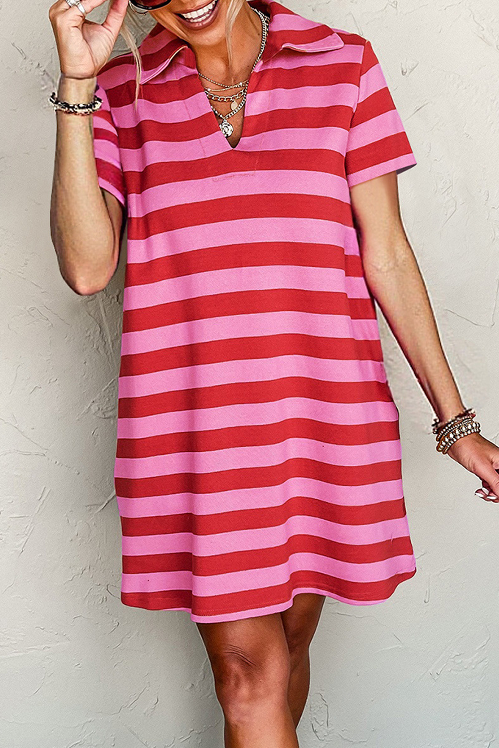 Striped dress shirt for men in pink and red with a stylish collar and short sleeves