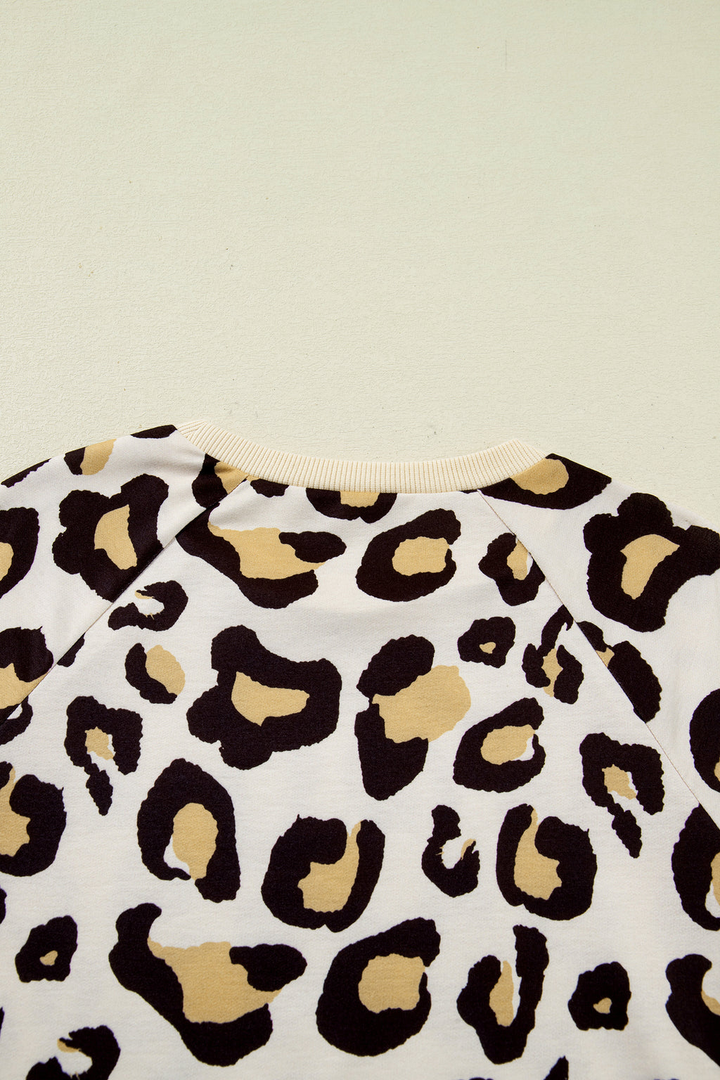 LuckeLadybug LLC T-Shirt featuring a stylish dress with leopard print design
