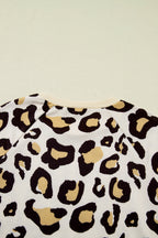 LuckeLadybug LLC T-Shirt featuring a stylish dress with leopard print design