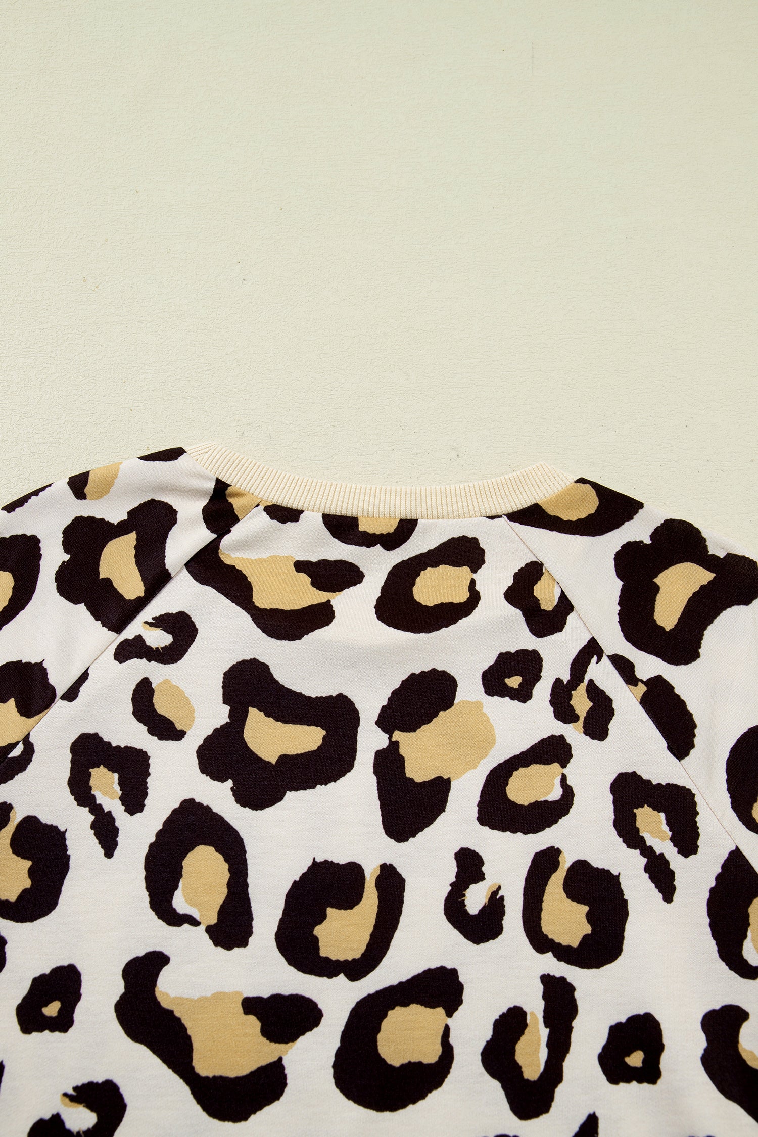 LuckeLadybug LLC T-Shirt featuring a stylish dress with leopard print design