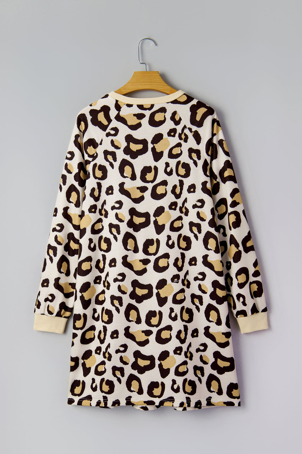 LuckeLadybug LLC dress with leopard print featuring a soft fabric and long sleeves