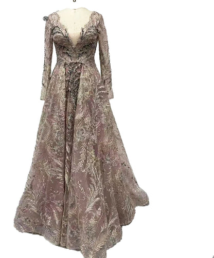 Luxurious Dubai mermaid evening gown with intricate detailing and elegant long sleeves