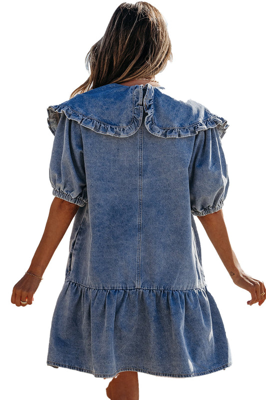 Dusk blue ruffled denim mini dress with puff sleeves and flared hem, perfect for beach outings