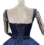 Back view of an elegant lace mini dress for women featuring a corset design and pleated skirt