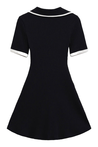 Back view of an elegant mini dress for women in navy with white collar and sleeve accents