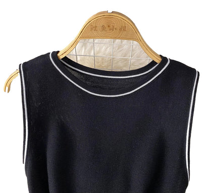 Elegant Y2K mini dress for women in black with a stylish neckline and sleeveless design