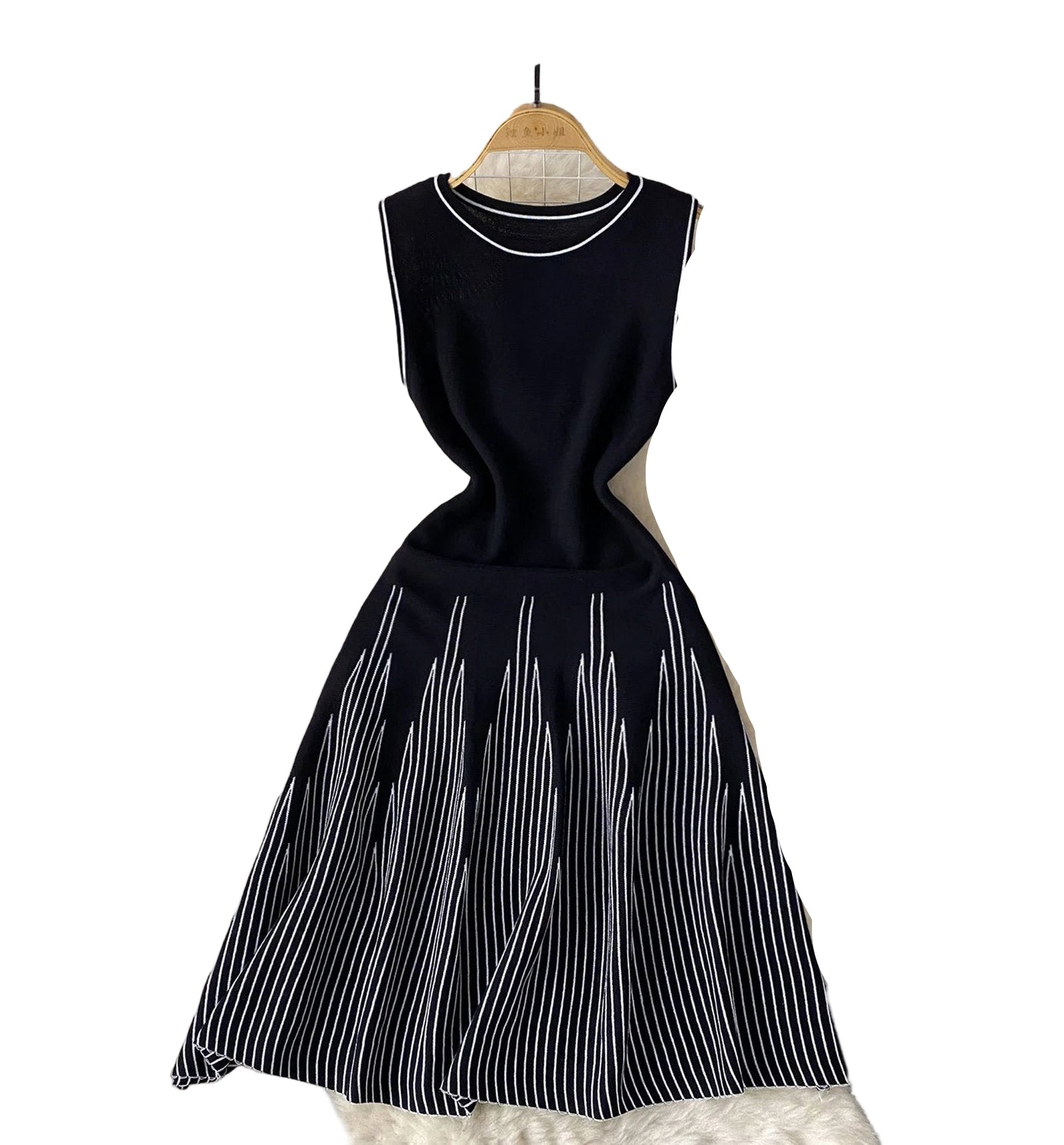 Elegant Y2K mini dress for women featuring a sleeveless design and stylish striped pattern