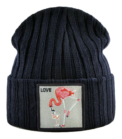 Navy embroidered beanies for women featuring a cute flamingo design and a love patch