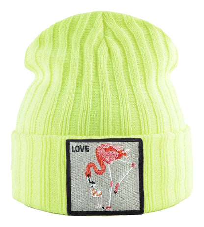 Bright yellow embroidered beanie for women featuring a flamingo design and the word Love