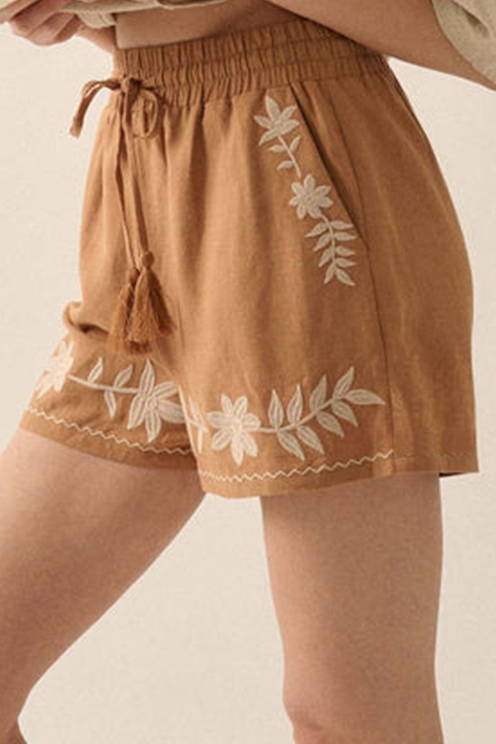 Trendy LuckeLAdybug embroidered shorts in tan with floral designs and drawstring waist