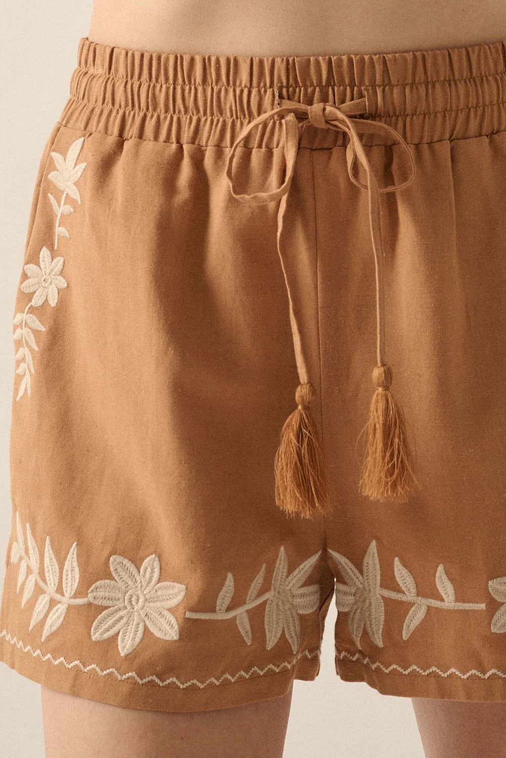 LuckeLAdybug LLC embroidered shorts in terracotta with floral design and tassel drawstring