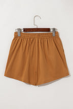 LuckeLAdybug LLC Embroidered shorts in a warm brown color with an elastic waistband for comfort