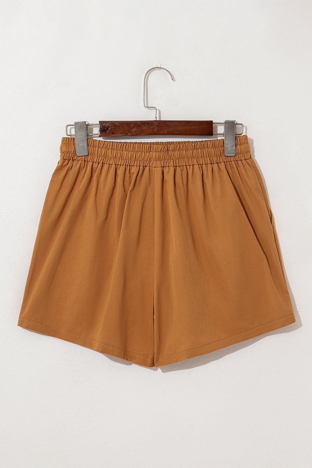 LuckeLAdybug LLC Embroidered shorts in a warm brown color with an elastic waistband for comfort