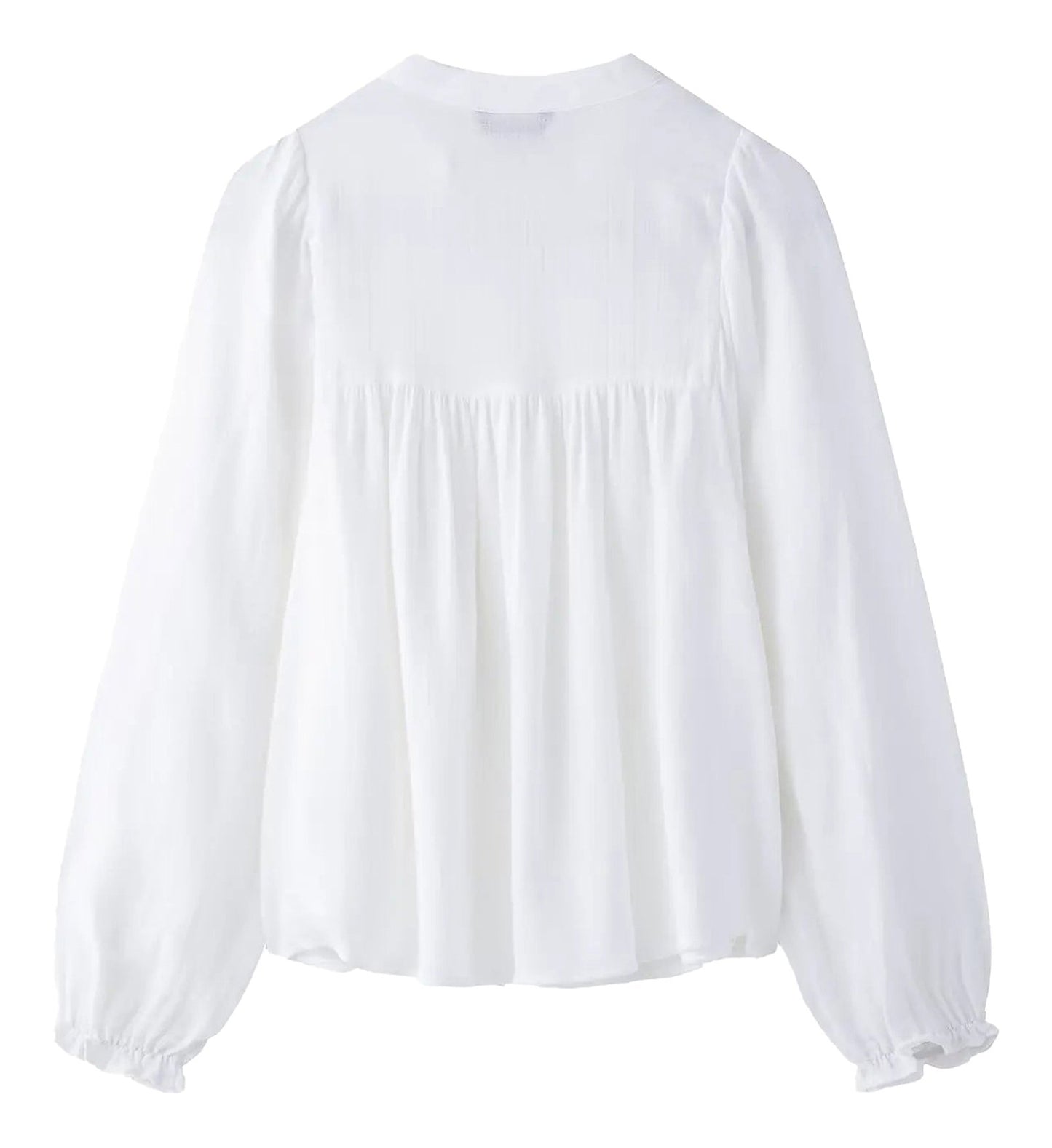 Back view of an embroidered white blouse for women with long puff sleeves from LuckeLadybug LLC