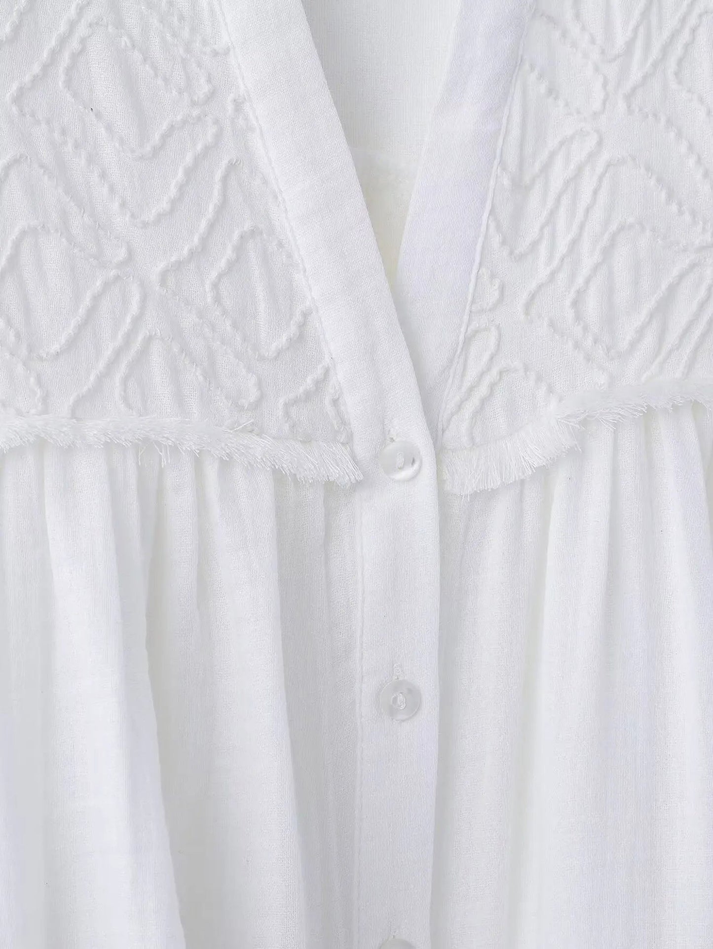 Embroidered white blouse for women with delicate detailing and button closure from LuckeLadybug LLC