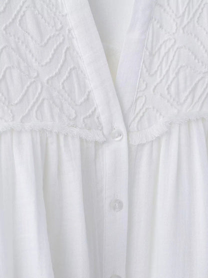 Embroidered white blouse for women with delicate detailing and button closure from LuckeLadybug LLC