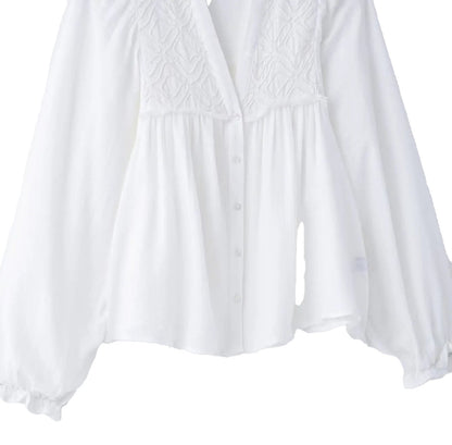 Embroidered white blouse for women featuring a button-down front and balloon sleeves