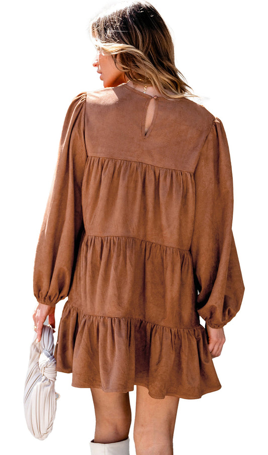 Rear view of woman in chestnut floral lace mini dress with tiered ruffle skirt long puff sleeves keyhole back