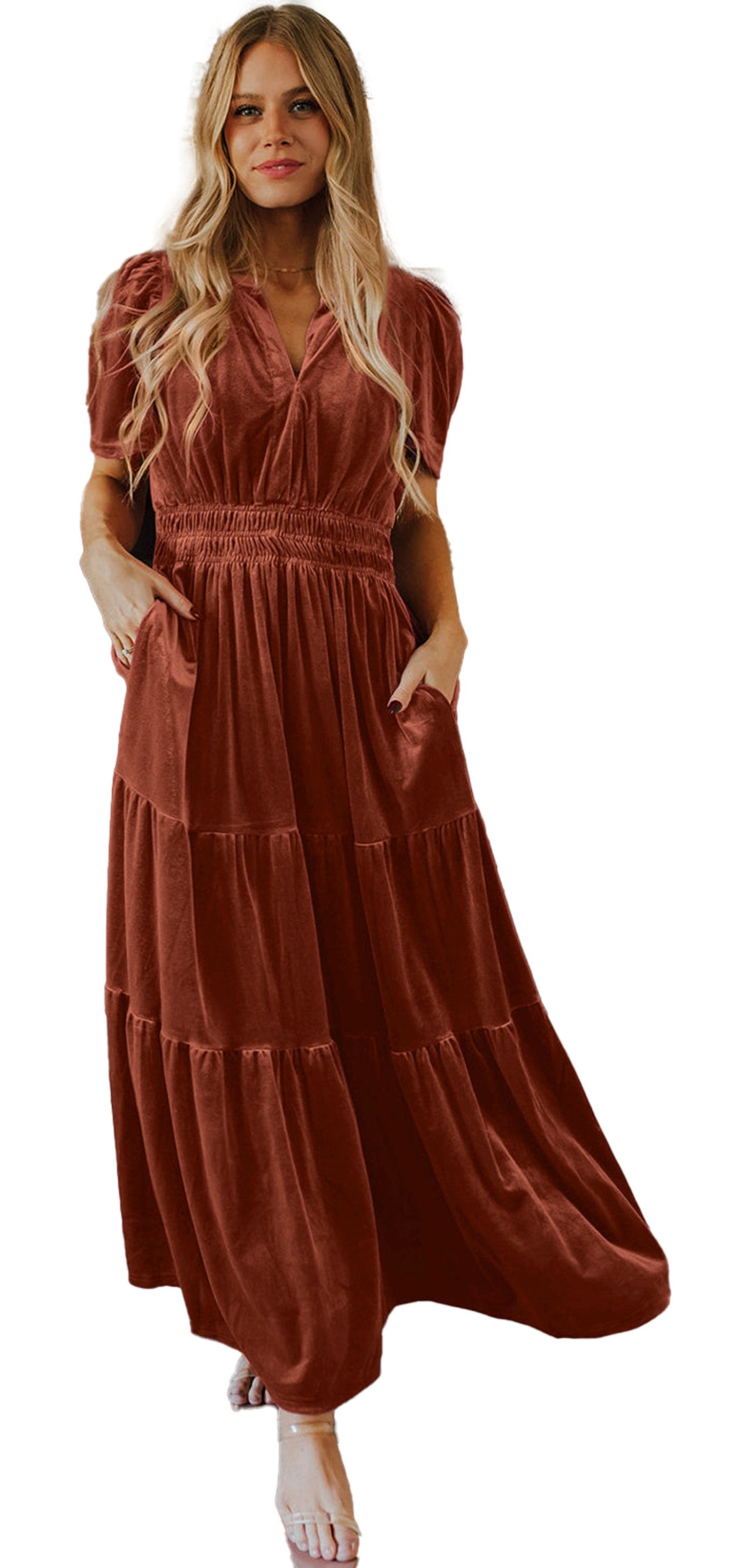 LuckeLadybug A Line red velvet maxi dress on model in front of fireplace with holiday stockings