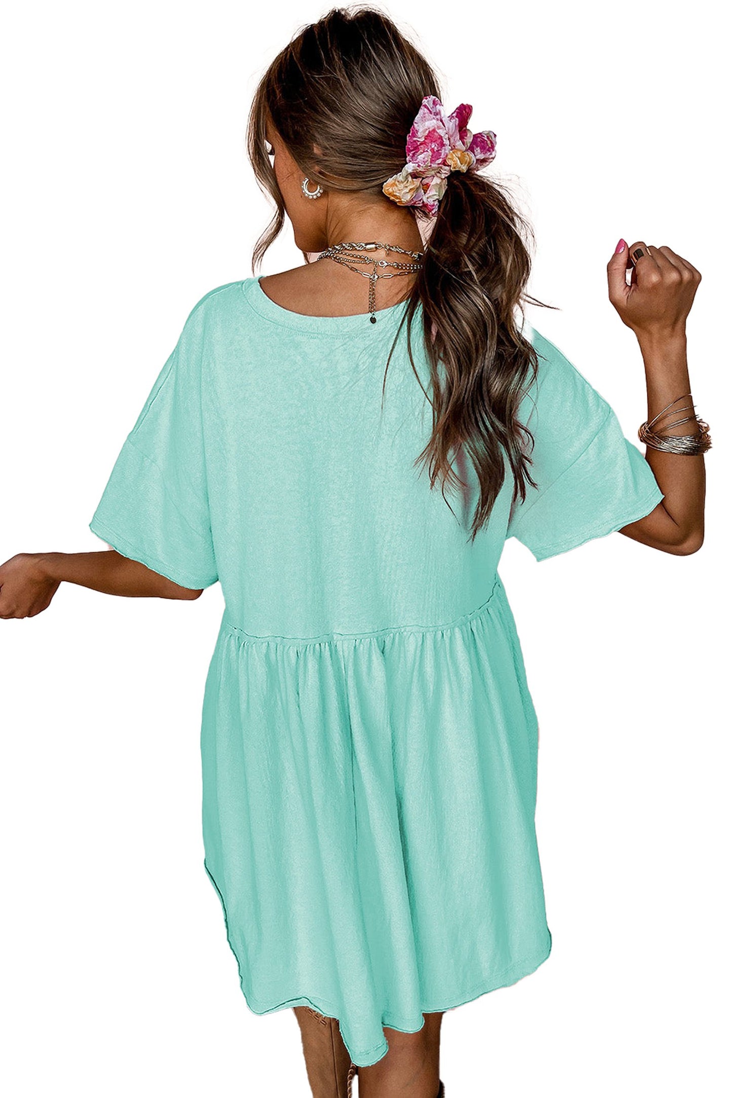 Rear view of model wearing LuckeLadybug sky blue babydoll dress with short sleeves gathered waist casual mini dress