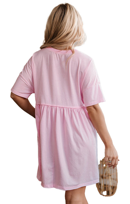 LuckeLadybug babydoll mini dress shown from back in soft pink with sky blue babydoll dress style reference