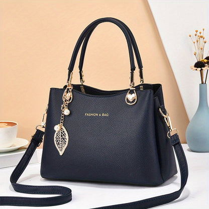 Elegant white handbag for women with stylish gold accents and a detachable shoulder strap