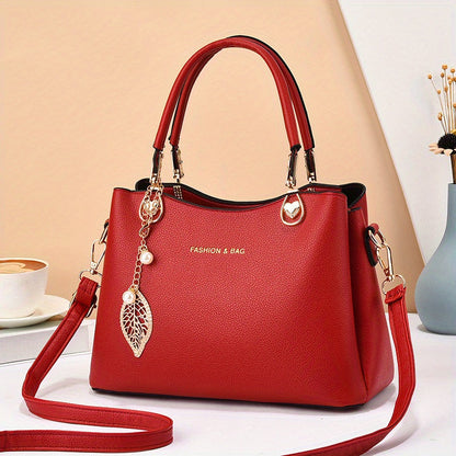 Stylish red satchel bag with detachable strap, perfect for pairing with an elegant white handbag for women
