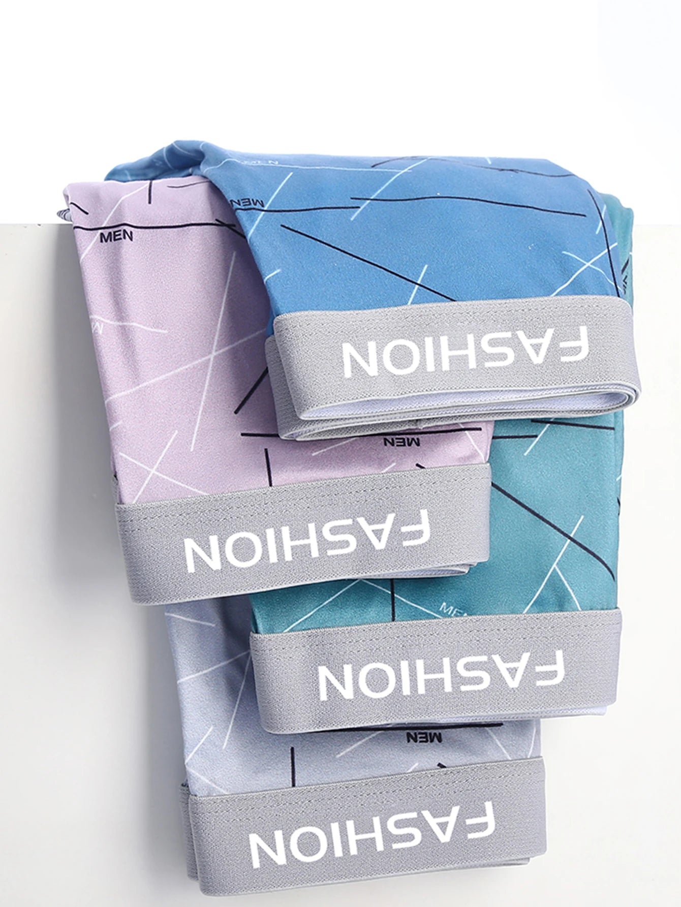 LuckeLadybug LLC men's boxer briefs set in blue and purple colors with stylish patterns and soft waistband