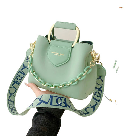LuckeLadybug LLC fashion top handle bucket bag in green with a stylish chain strap for modern styling