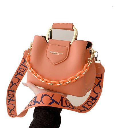 LuckeLadybug fashion top handle bucket bag in orange with a stylish chain and strap for everyday use