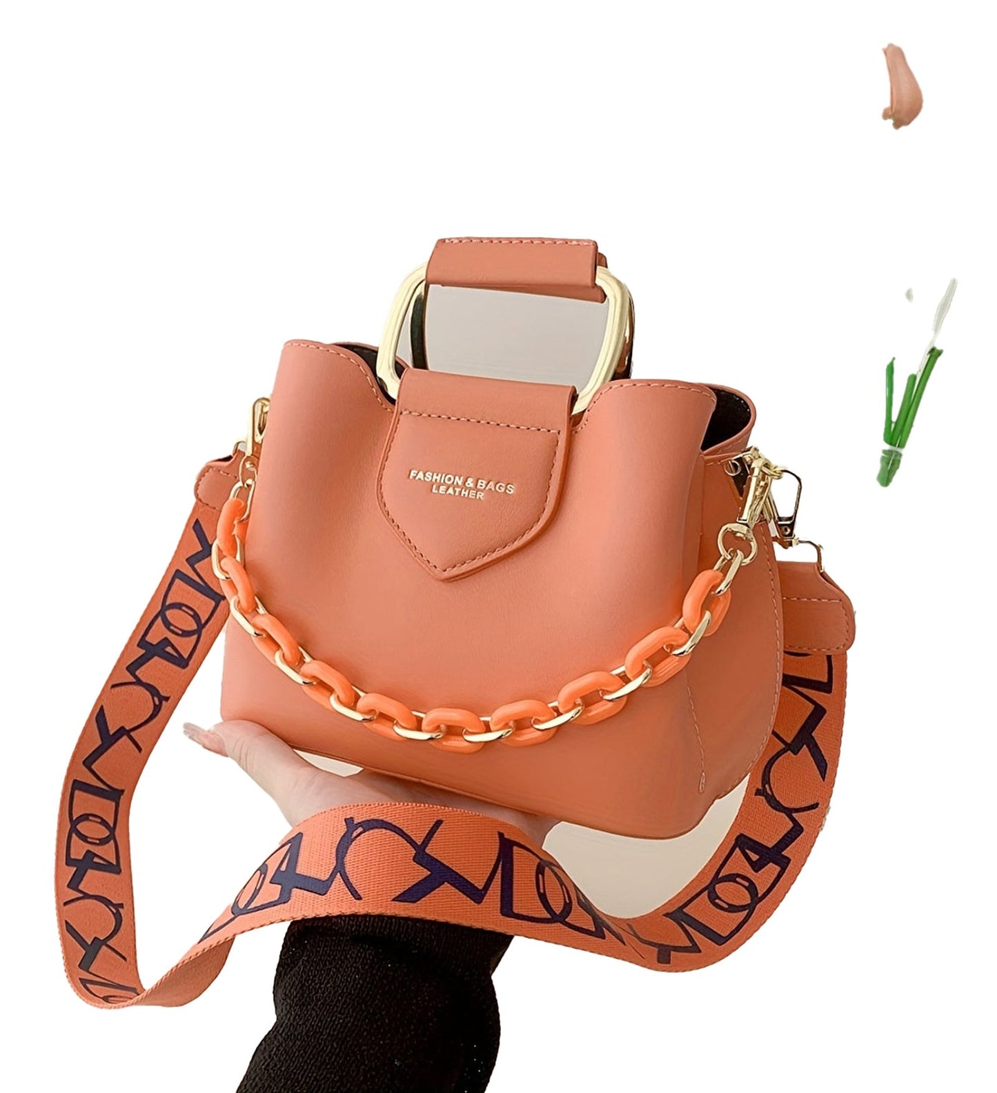 LuckeLadybug LLC fashion top handle bucket bag in orange with a stylish chain strap and golden accents