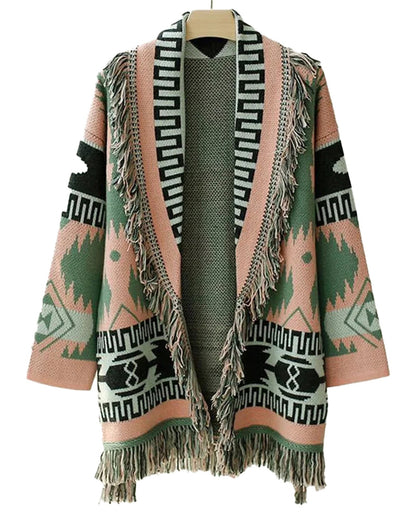Stylish patterned kimono with fringe, ideal for layering over a waist cinching mini dress for women